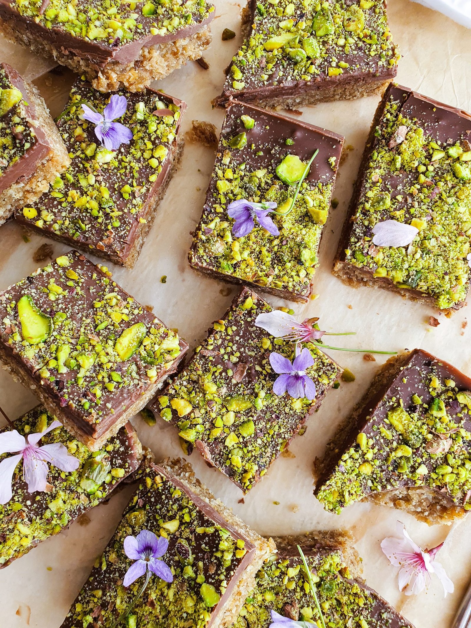 Enjoy the perfect balance of flavors in every bite of these 4 ingredient Tahini Pistachio Date Bars. A healthy and delicious snack made with simple ingredients.