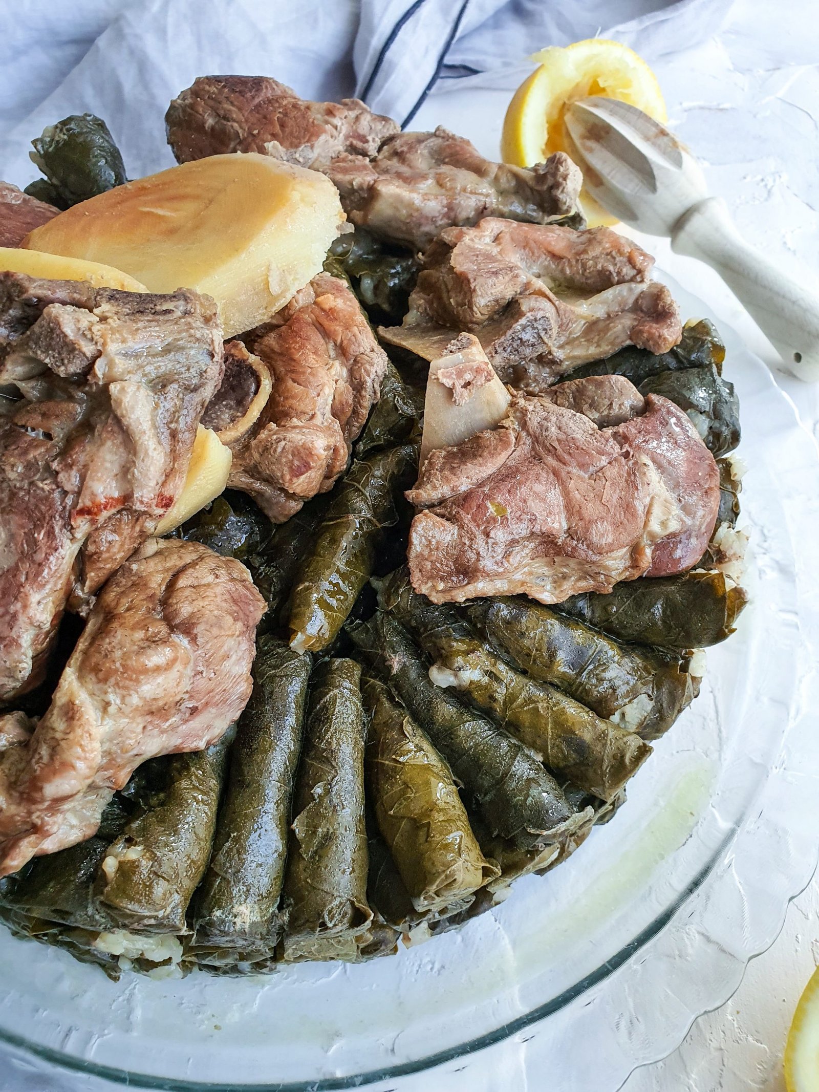 A beautiful plate of stuffed dolmas with lamb meat.. juicy and tender