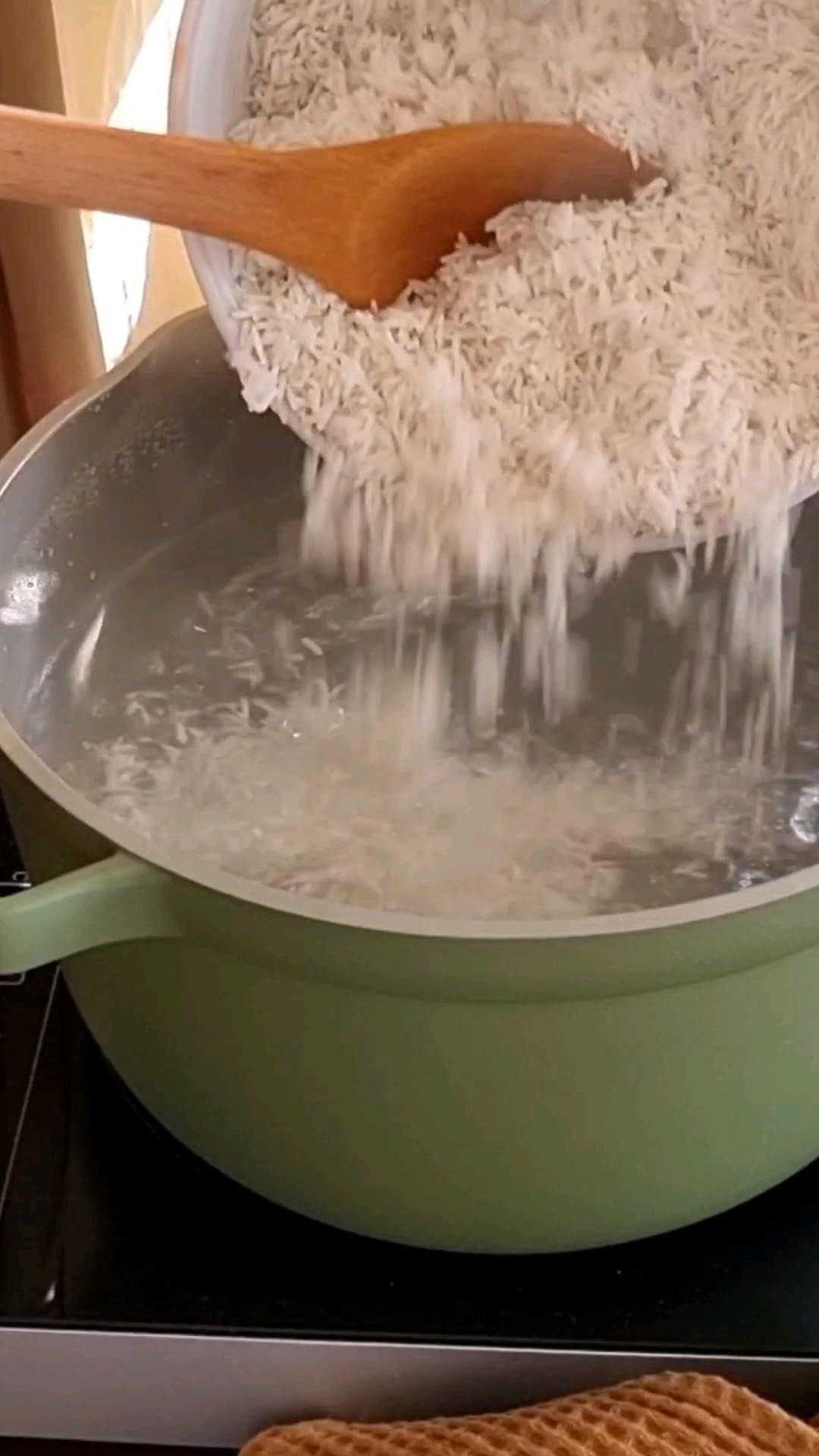 Parboil the rice in hot water for 5 minutes.