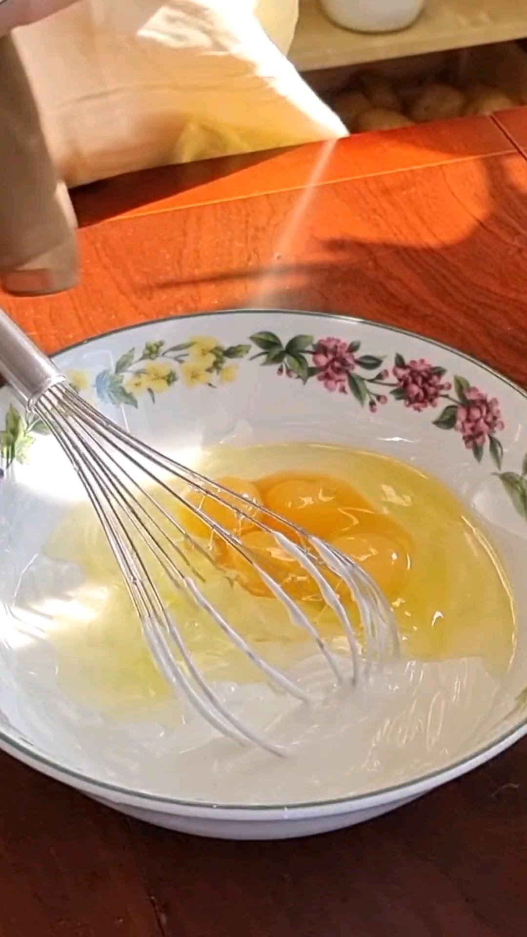 Make the yogurt mixture. Start by adding the eggs.