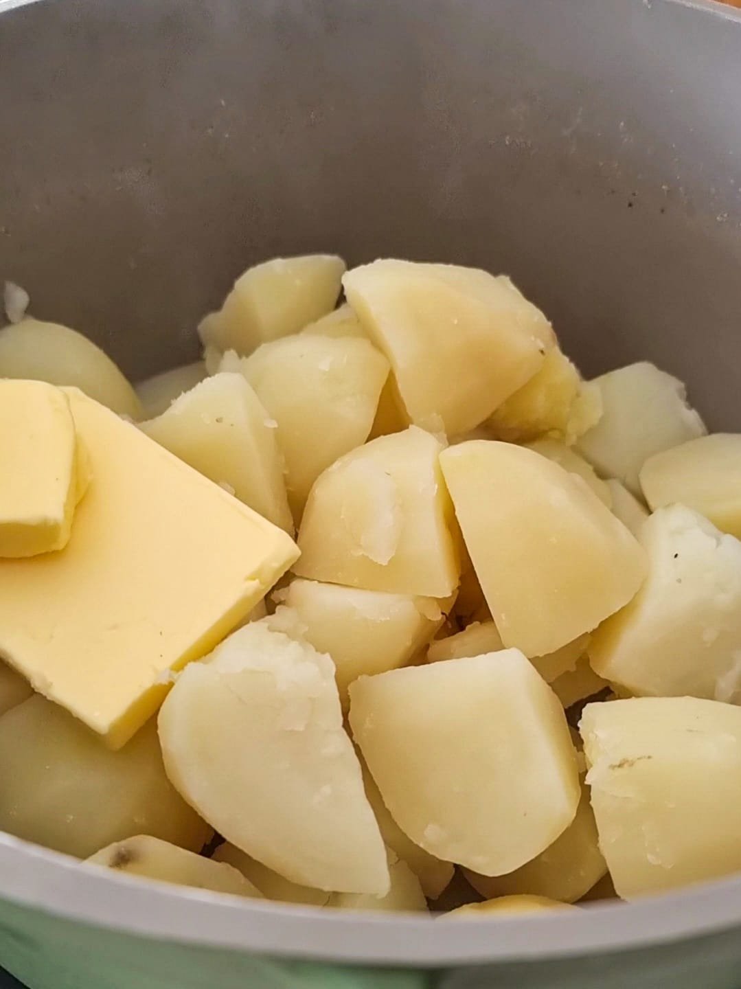 Boil your potatoes enough that your fork goes all the way through, then mash with butter and milk.