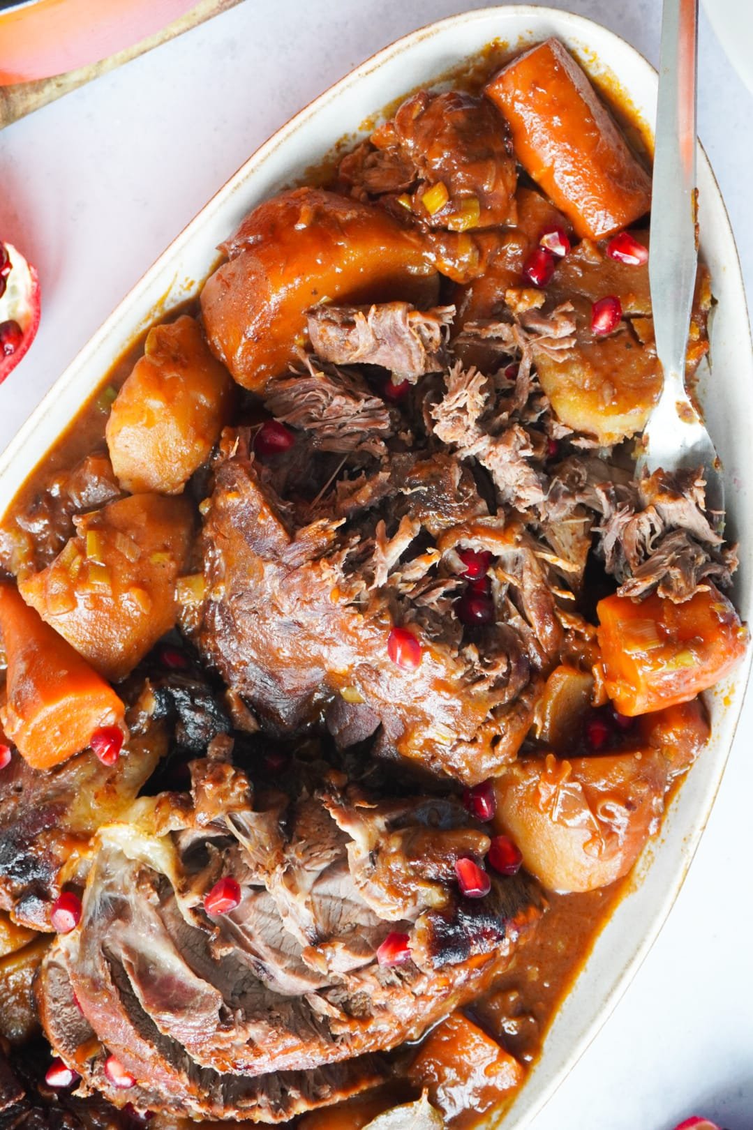 Beef Shanks recipe made in a the oven with pomegranate seeds sprinkled on top