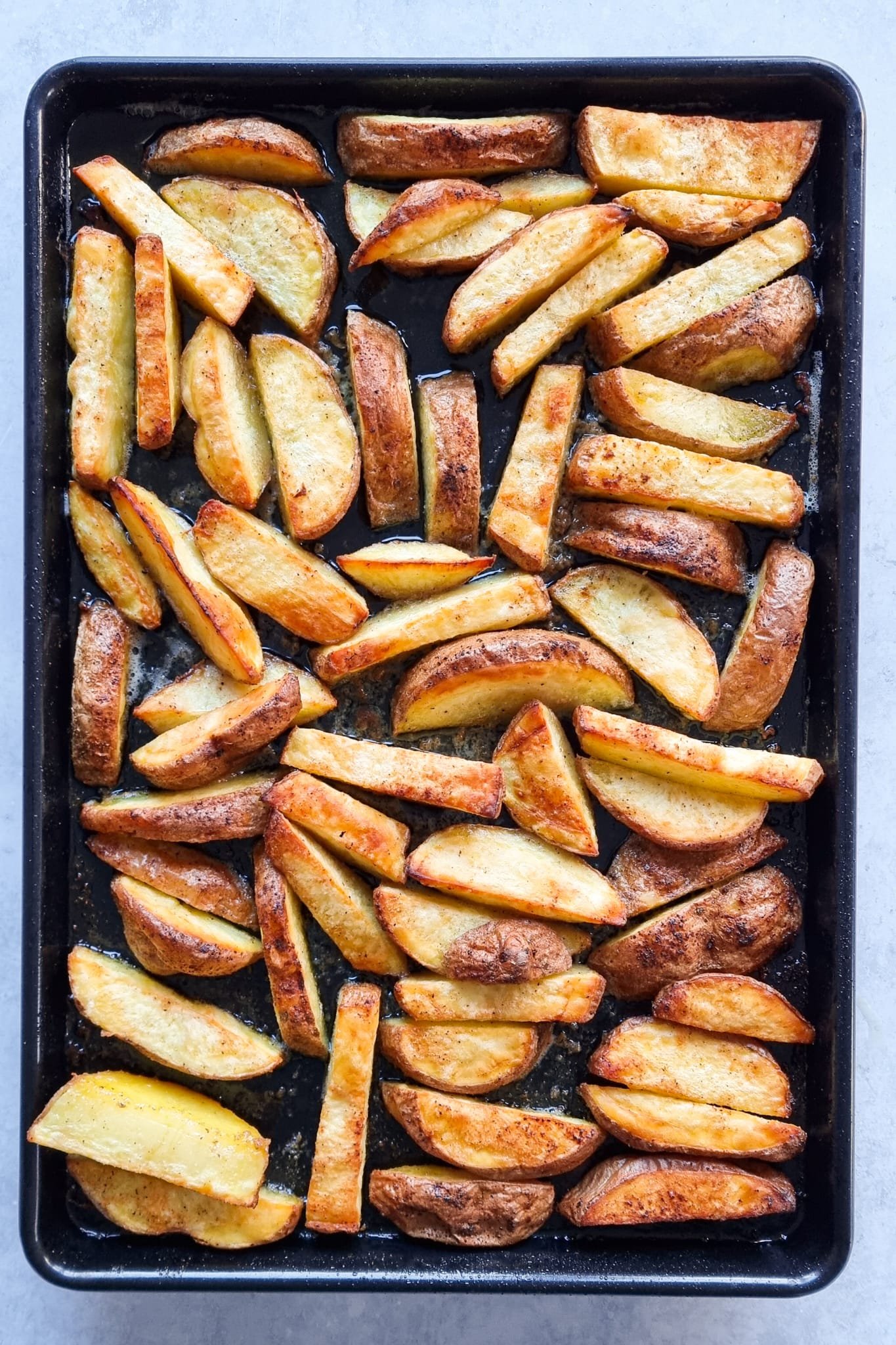Golden and super crunchy oven roasted potatoes