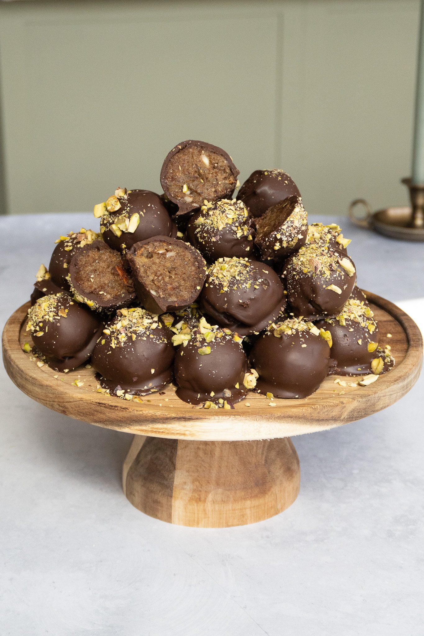 A tray of homemade chocolate date truffles, ready to be served for dessert.