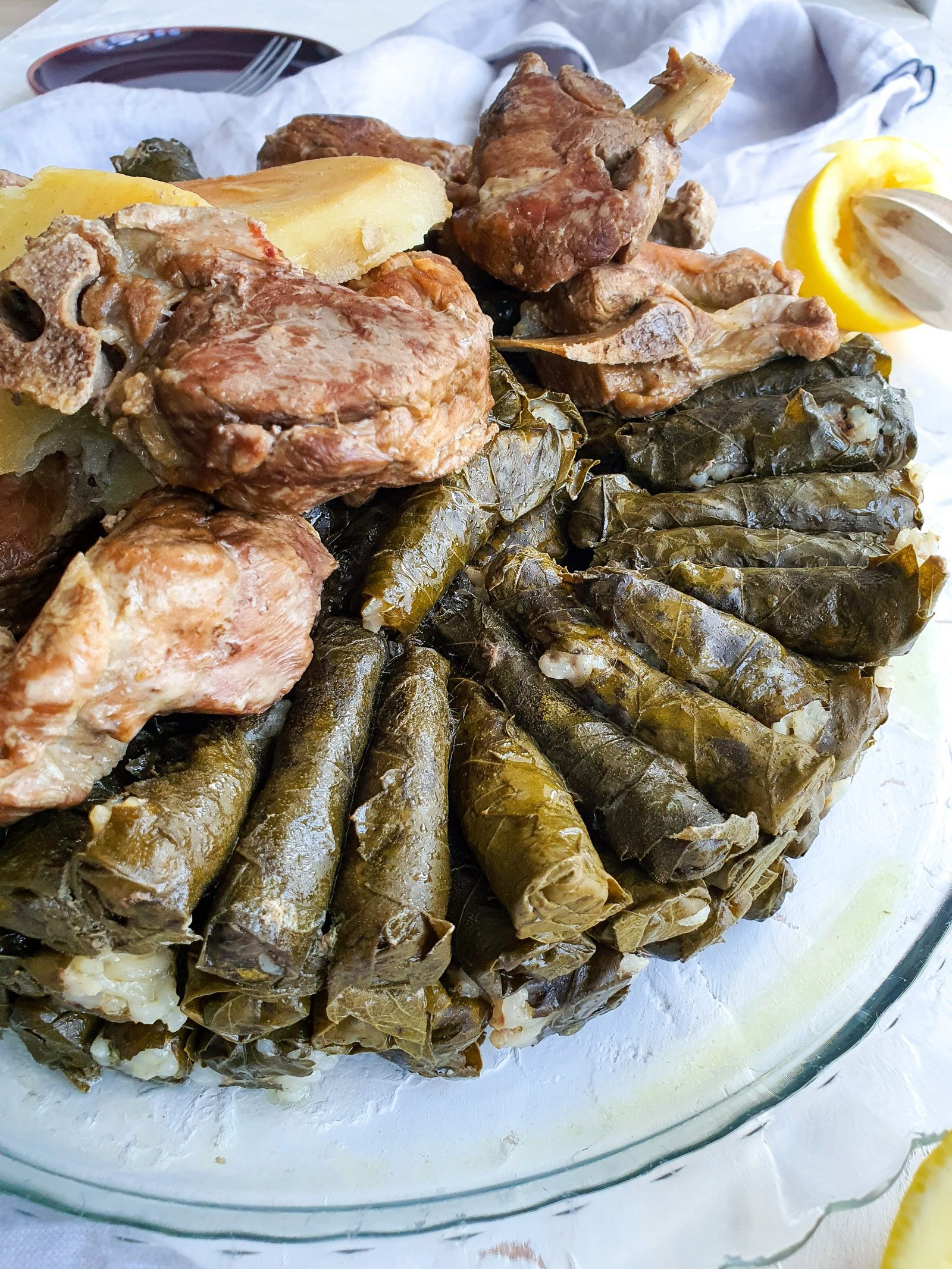 Syrian Stuffed Vine Leaves (Warak Enab) with lamb in bone is a savory flavorful meal
