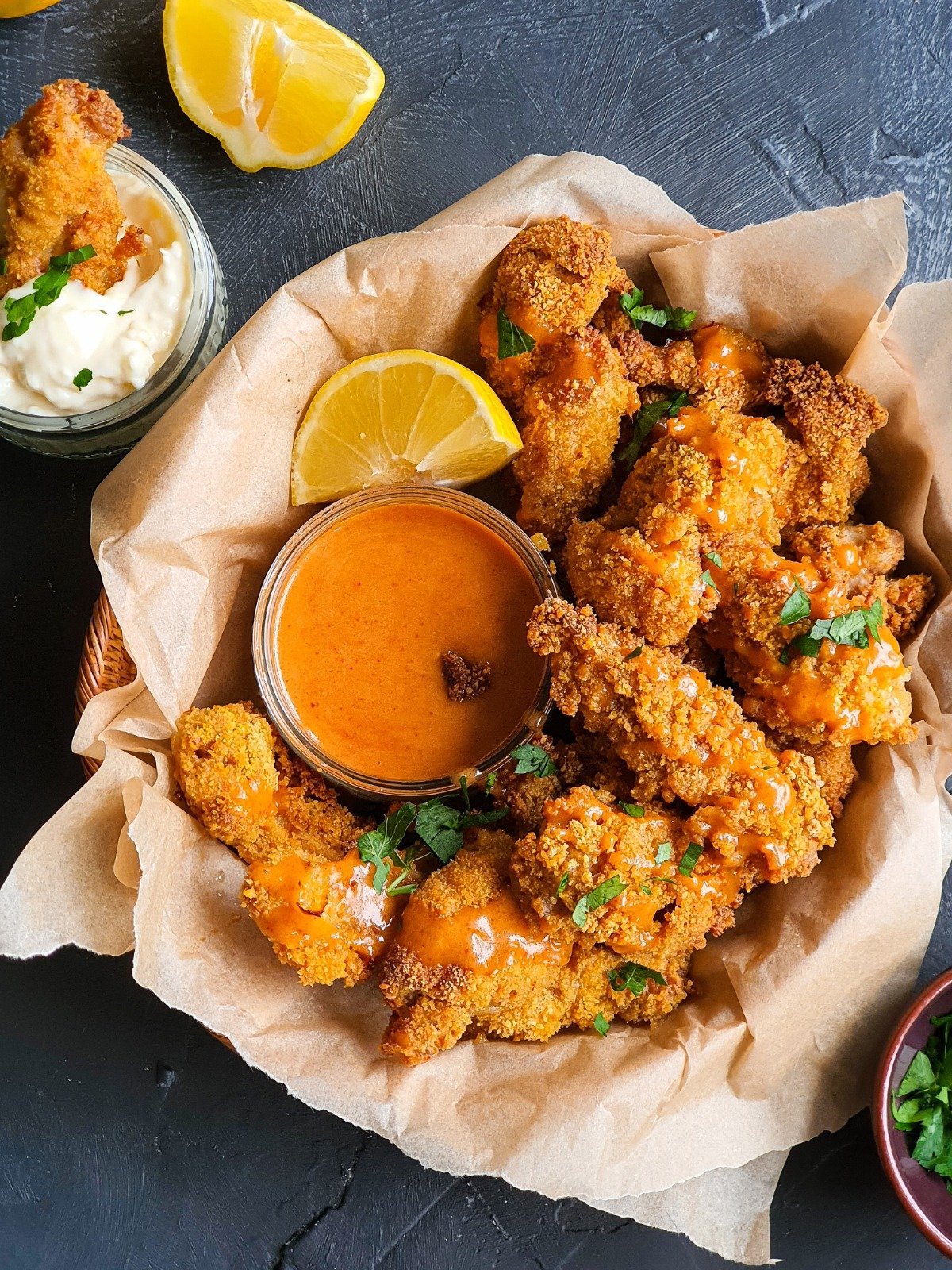 Baked chicken strips are perfect with mustard honey sriracha sauce
