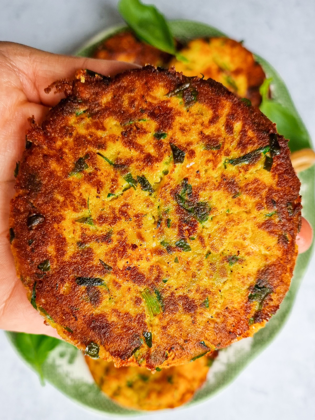 Kuku Sibzamini or potato patties with cheese