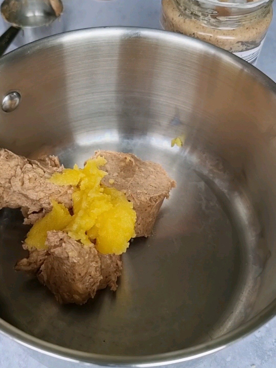 Melting the peanut butter with ghee