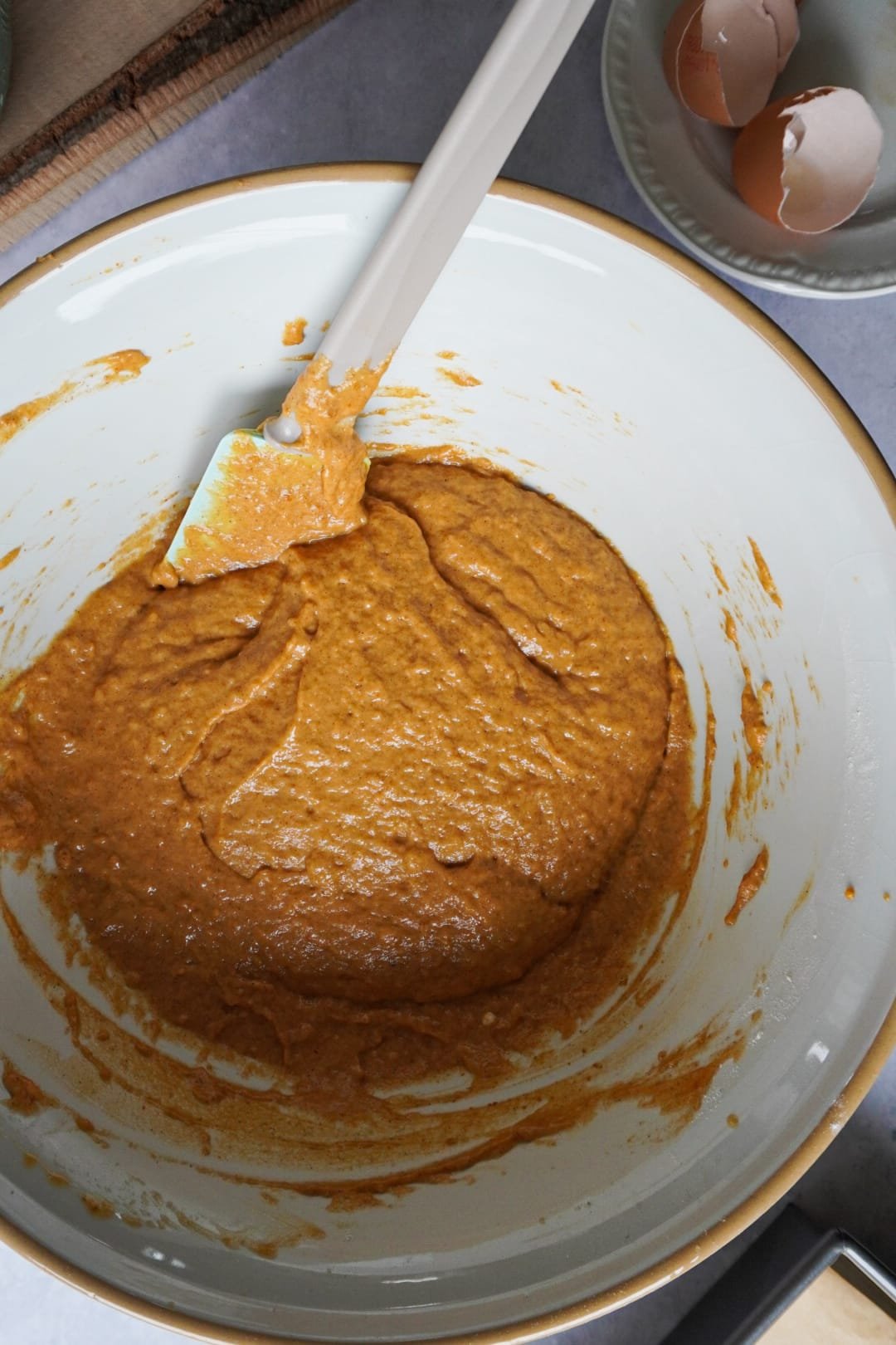 First, mix all your wet ingredients in a bowl.  Start with the sugar and eggs, mix them well together, then add the pumpkin puree and mix again.  