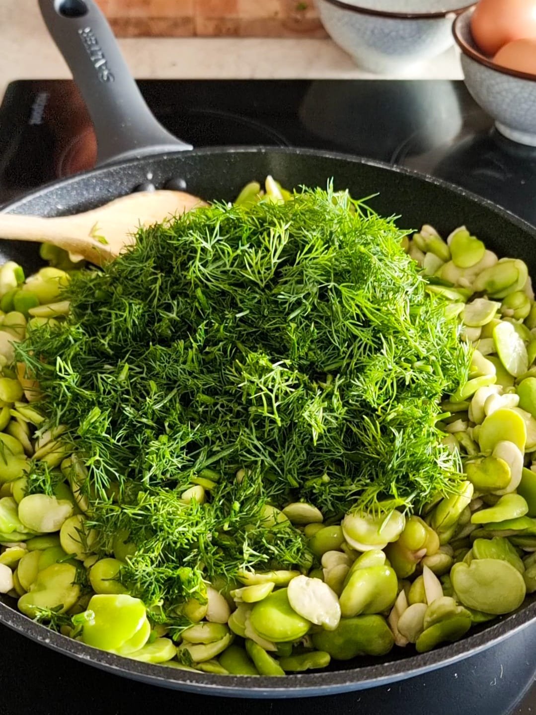 the Persian dill on the top of fava beans and garlic