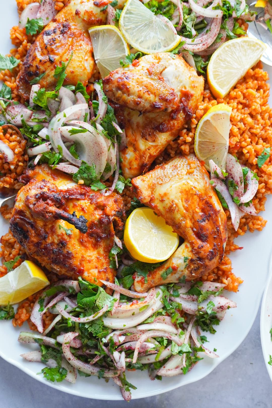 Assemble your dish together on a serving plate, the bulgur, the chicken pieces and the salad.