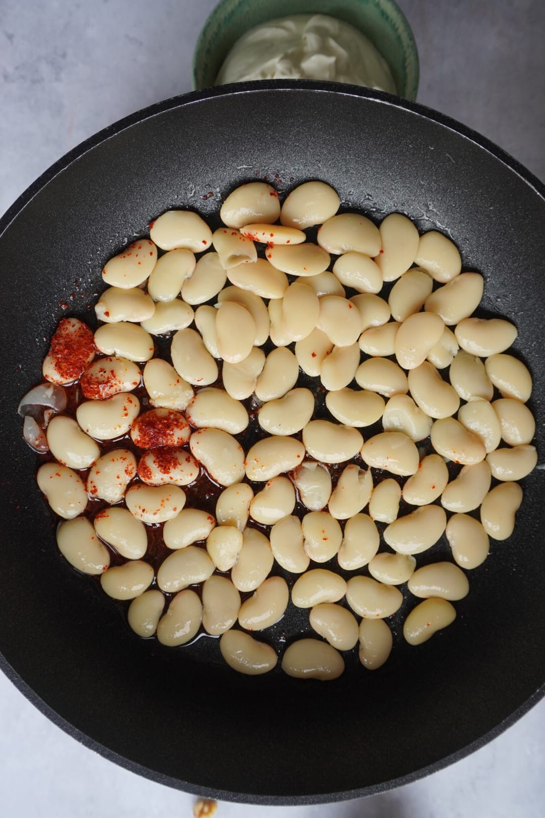 Roasted butter beans and aleppo pepper needed for Tahini Walnut Aubergine Dip with Crispy Butter Beans