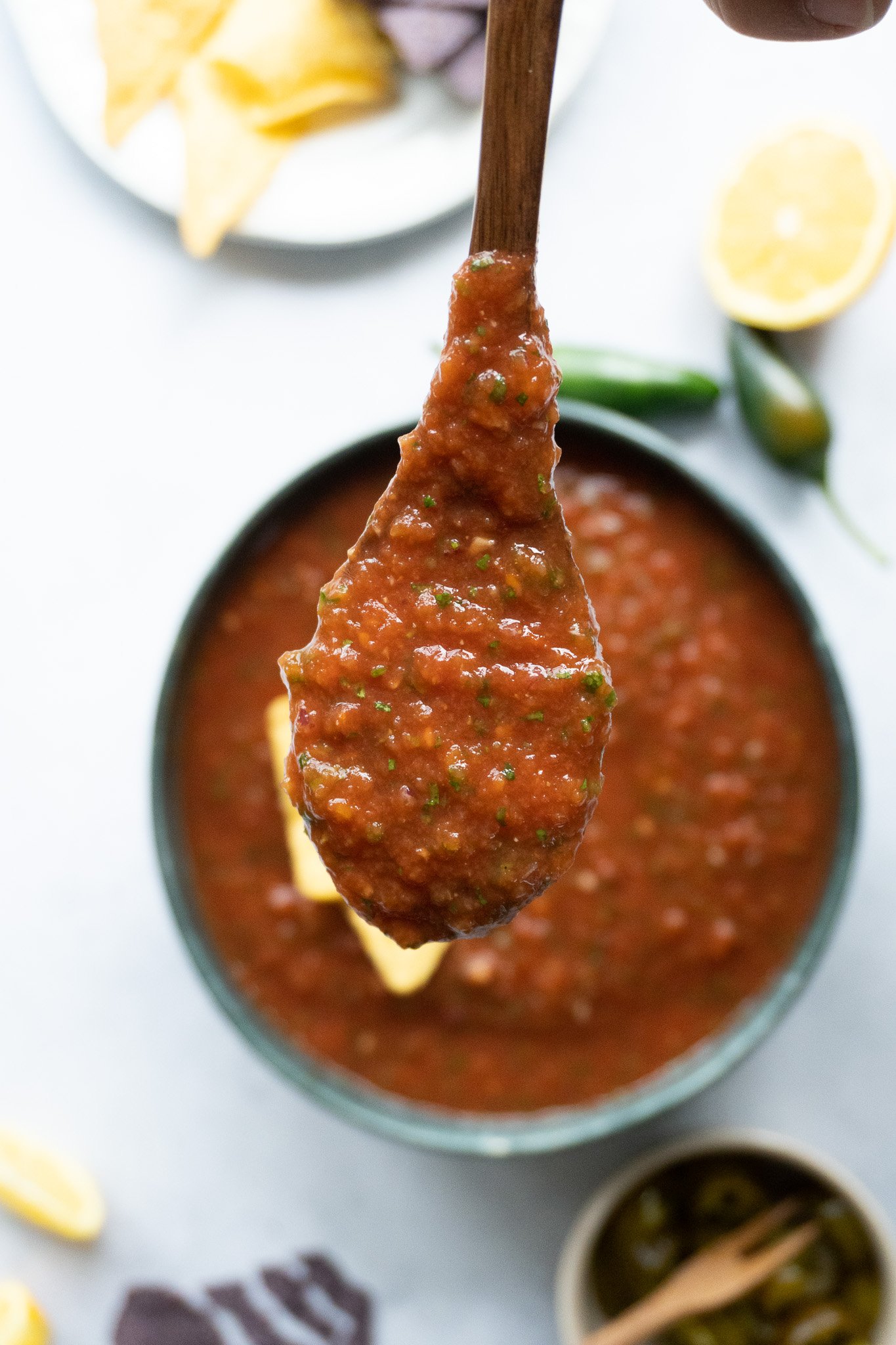 spoonful of homemade salsa sauce recipe linked 