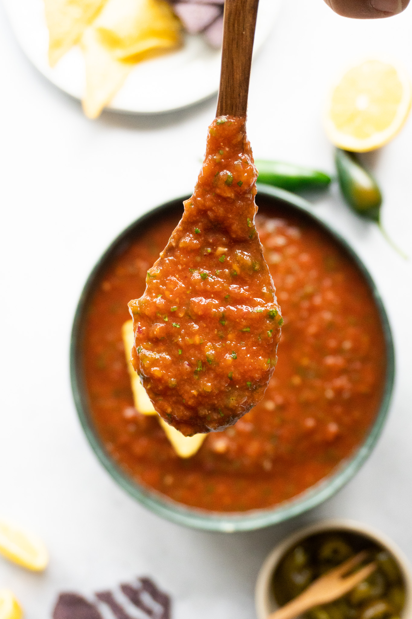 A mouthwatering sight of Classic Tomato Salsa, a delightful Costco Copycat creation. Freshly diced tomatoes, finely chopped red onions, minced garlic, and fragrant cilantro combine to form a flavorful and visually appealing salsa.