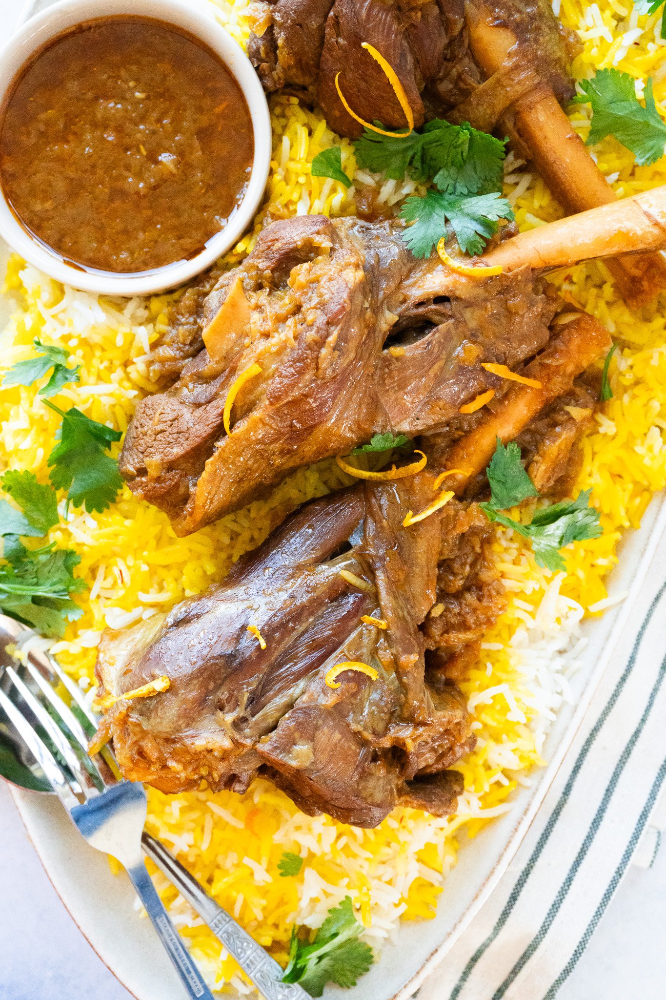 Mouthwatering Persian Lamb Shank - Tender lamb shank infused with aromatic spices, ready to be savored.