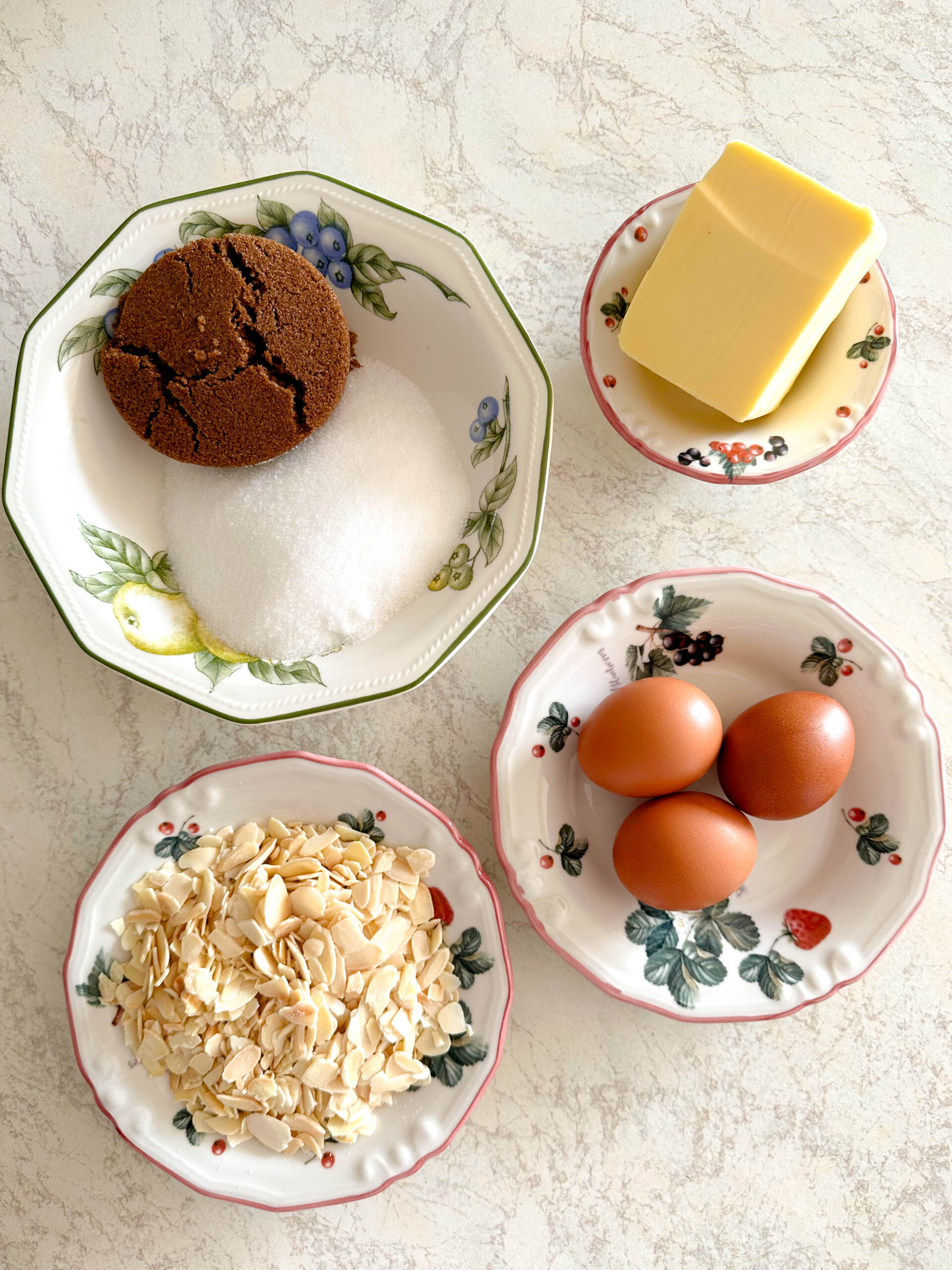 Brown sugar, caster sugar, almonds, eggs and butter ready for baking