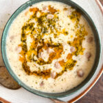 Lebeniye Soup – The Best Turkish Meatball and Yoghurt Soup, showing creamy broth, golden meatballs, and chickpeas.